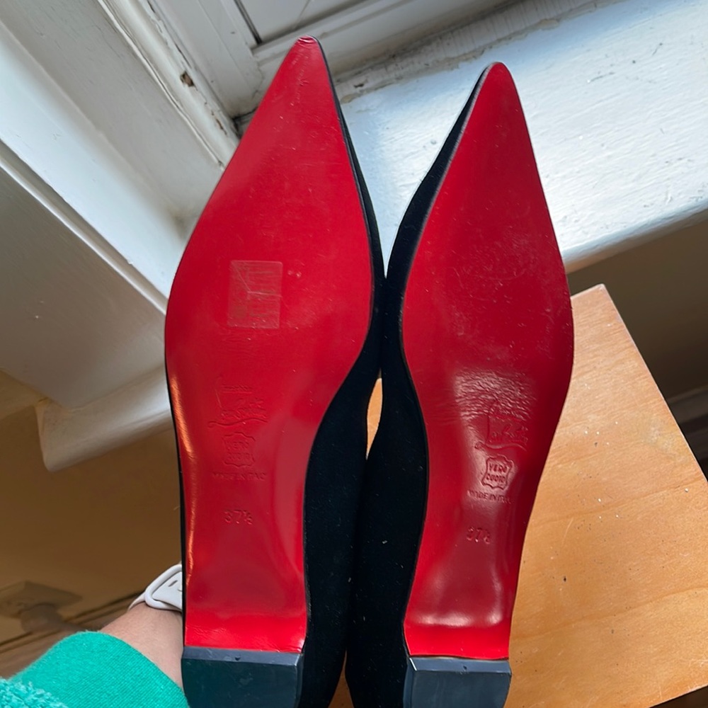 Christian Louboutin flats NEVER WORN TAGS ON! Size 37.5 US 7